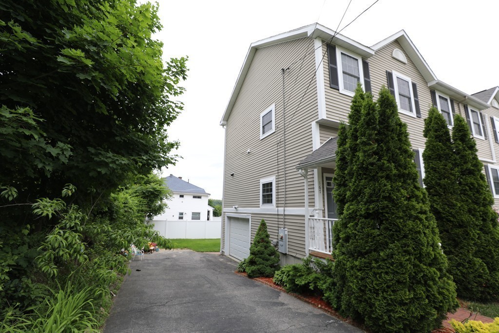 167 Orient Street Worcester, MA 01604 - Photo 4 of 29 front view of a house with a yard