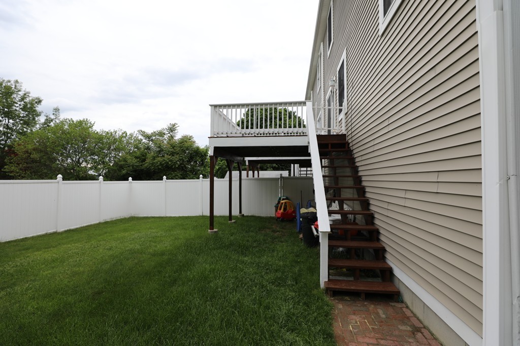 167 Orient Street Worcester, MA 01604 - Photo 5 of 29 a view of a back yard of the house