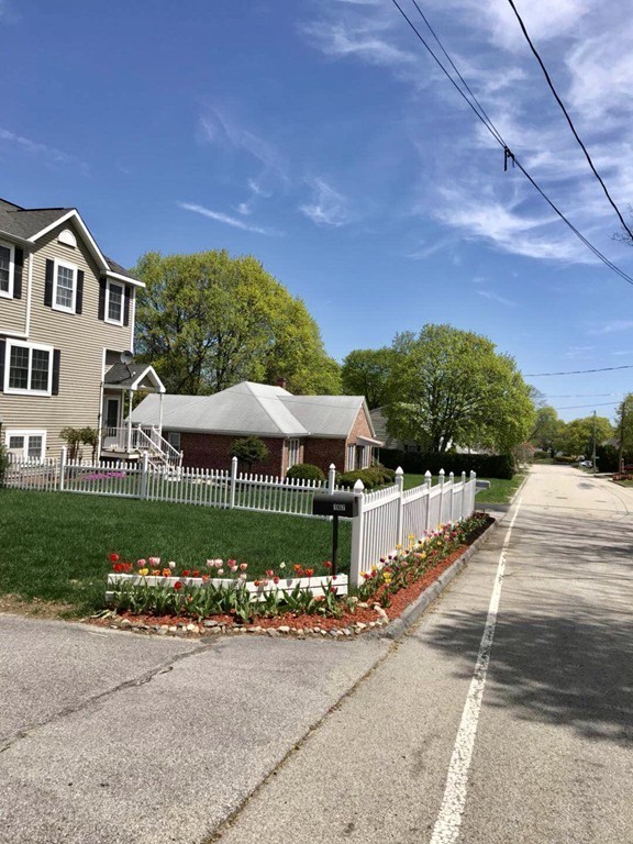 167 Orient Street Worcester, MA 01604 - Photo 8 of 29 a view of a house with a yard and garden