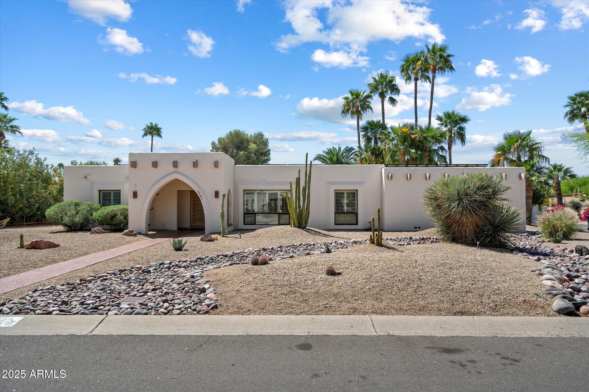 5701 East Charter Oak Road Scottsdale, AZ 85254 - Photo 27 of 27 a view of a house with a snow