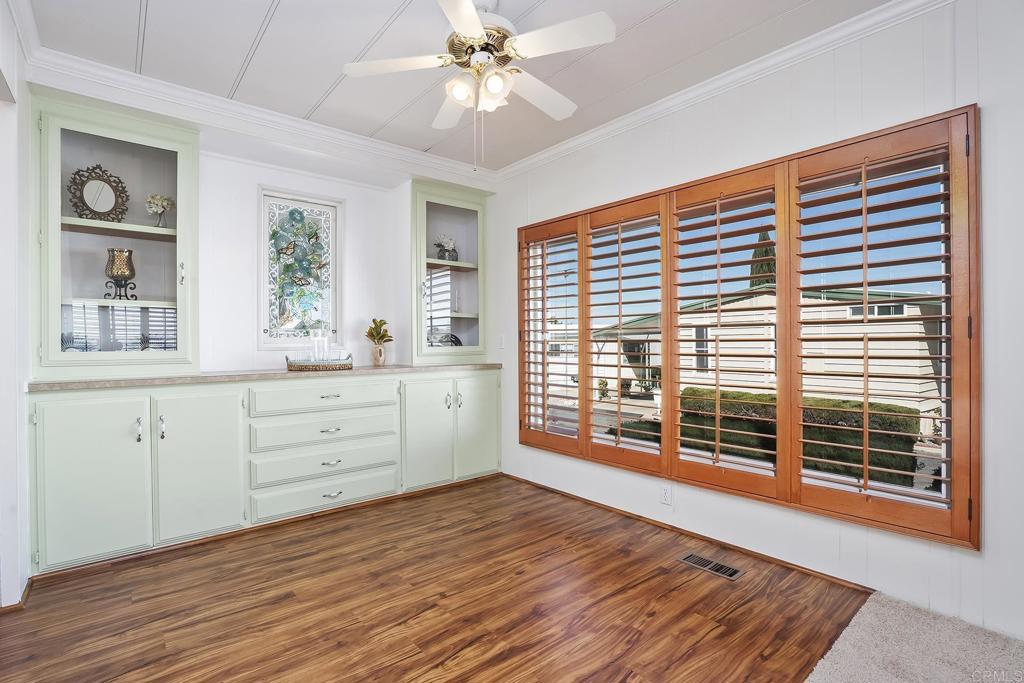 7467 Mission Gorge Road, Unit SPC 81 Santee, CA 92071 - Photo 11 of 36 workspace with wooden floor fan and windows