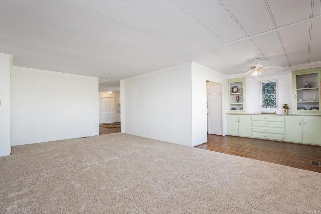 7467 Mission Gorge Road, Unit SPC 81 Santee, CA 92071 - Photo 13 of 36 a view of a kitchen with a sink and a window