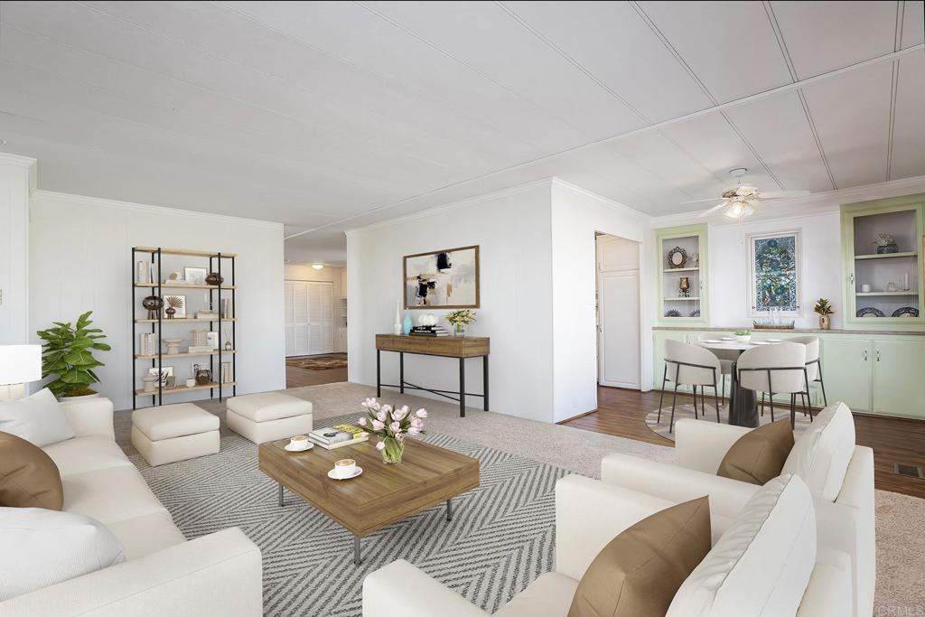 7467 Mission Gorge Road, Unit SPC 81 Santee, CA 92071 - Photo 14 of 36 a living room with furniture and wooden floor