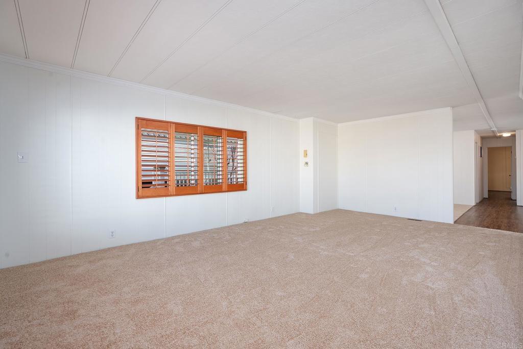 7467 Mission Gorge Road, Unit SPC 81 Santee, CA 92071 - Photo 15 of 36 a view of an empty room with a window