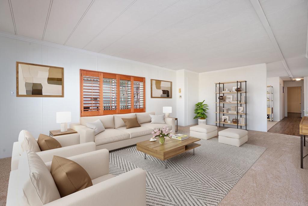 7467 Mission Gorge Road, Unit SPC 81 Santee, CA 92071 - Photo 16 of 36 a living room with furniture and a large window