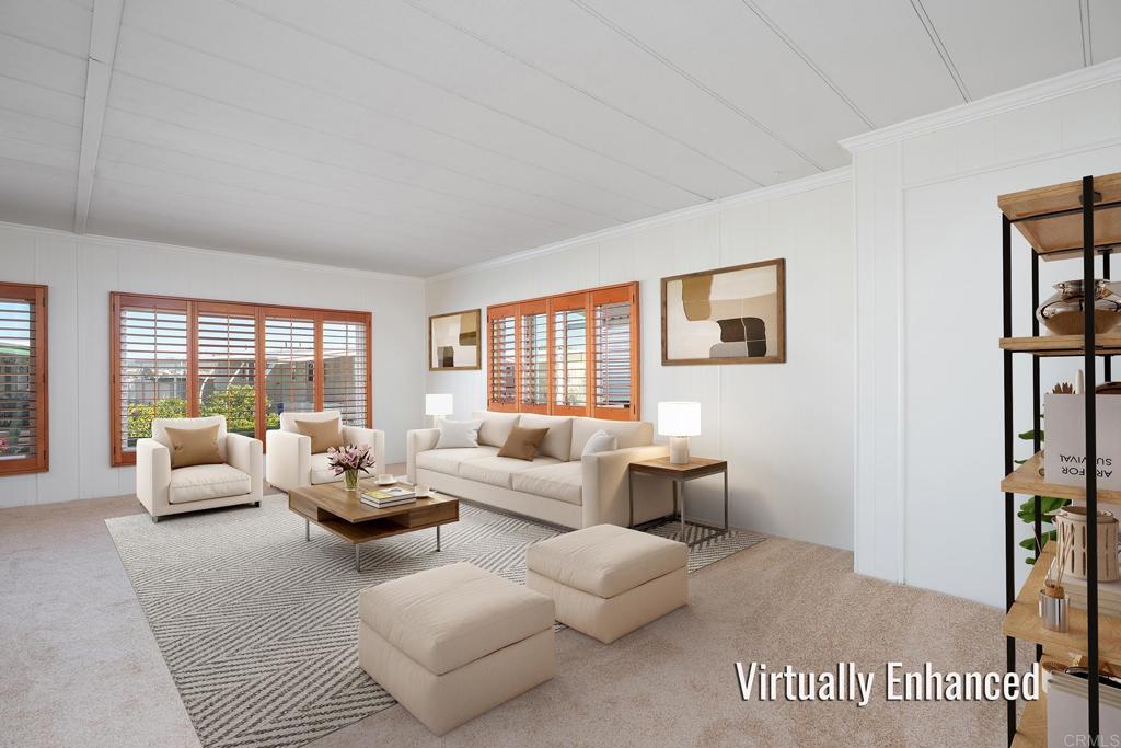 7467 Mission Gorge Road, Unit SPC 81 Santee, CA 92071 - Photo 18 of 36 a living room with furniture or couch and a window