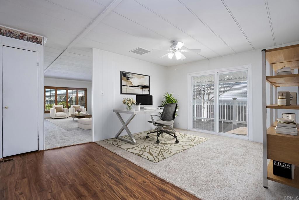 7467 Mission Gorge Road, Unit SPC 81 Santee, CA 92071 - Photo 20 of 36 a view of a livingroom with workspace and a window