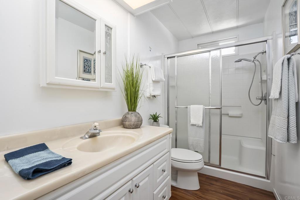 7467 Mission Gorge Road, Unit SPC 81 Santee, CA 92071 - Photo 31 of 36 a bathroom with a sink toilet and shower