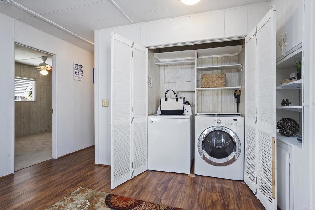 7467 Mission Gorge Road, Unit SPC 81 Santee, CA 92071 - Photo 33 of 36 a room with a washer and dryer
