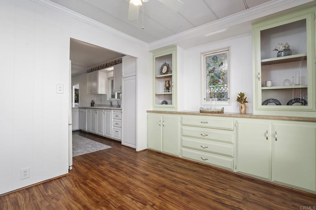 7467 Mission Gorge Road, Unit SPC 81 Santee, CA 92071 - Photo 10 of 36 a kitchen with a refrigerator and a sink