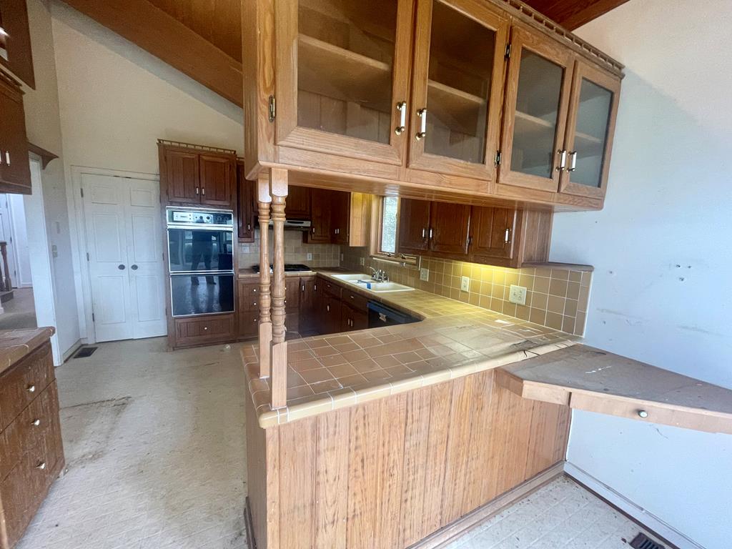574 Old Chipley Road Pine Mountain, GA 31822 - Photo 11 of 61 a kitchen with stainless steel appliances granite countertop a sink and a granite counter tops