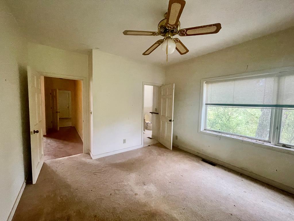 574 Old Chipley Road Pine Mountain, GA 31822 - Photo 19 of 61 a view of an empty room with a window