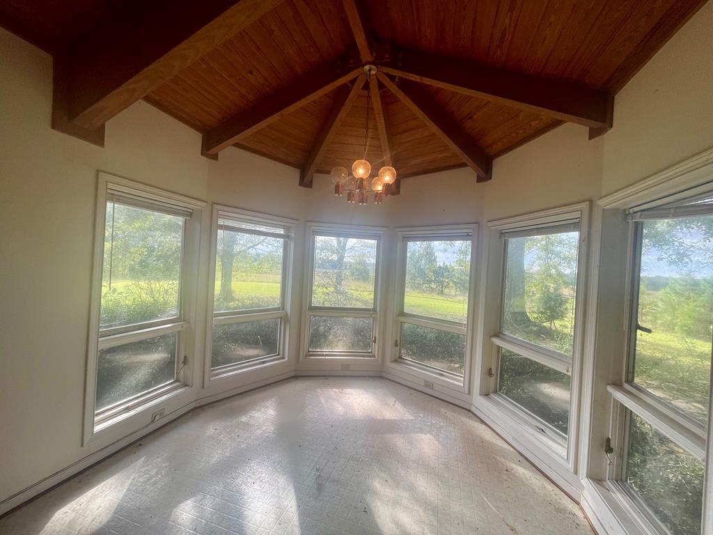 574 Old Chipley Road Pine Mountain, GA 31822 - Photo 2 of 61 a view of empty room with wooden floor and fan