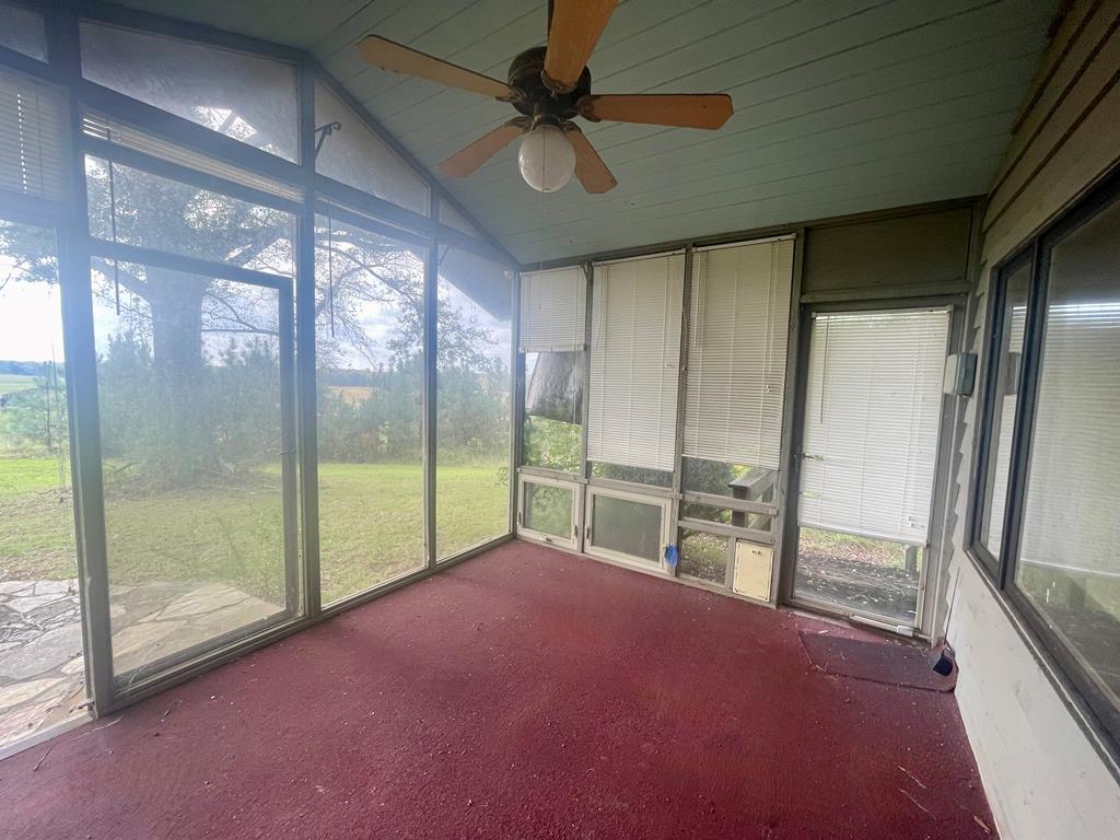 574 Old Chipley Road Pine Mountain, GA 31822 - Photo 28 of 61 a view of empty room with a floor to ceiling window and ceiling fan