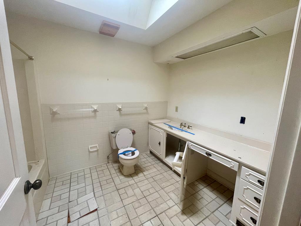 574 Old Chipley Road Pine Mountain, GA 31822 - Photo 38 of 61 a view of a storage and utility room with racks on the wall