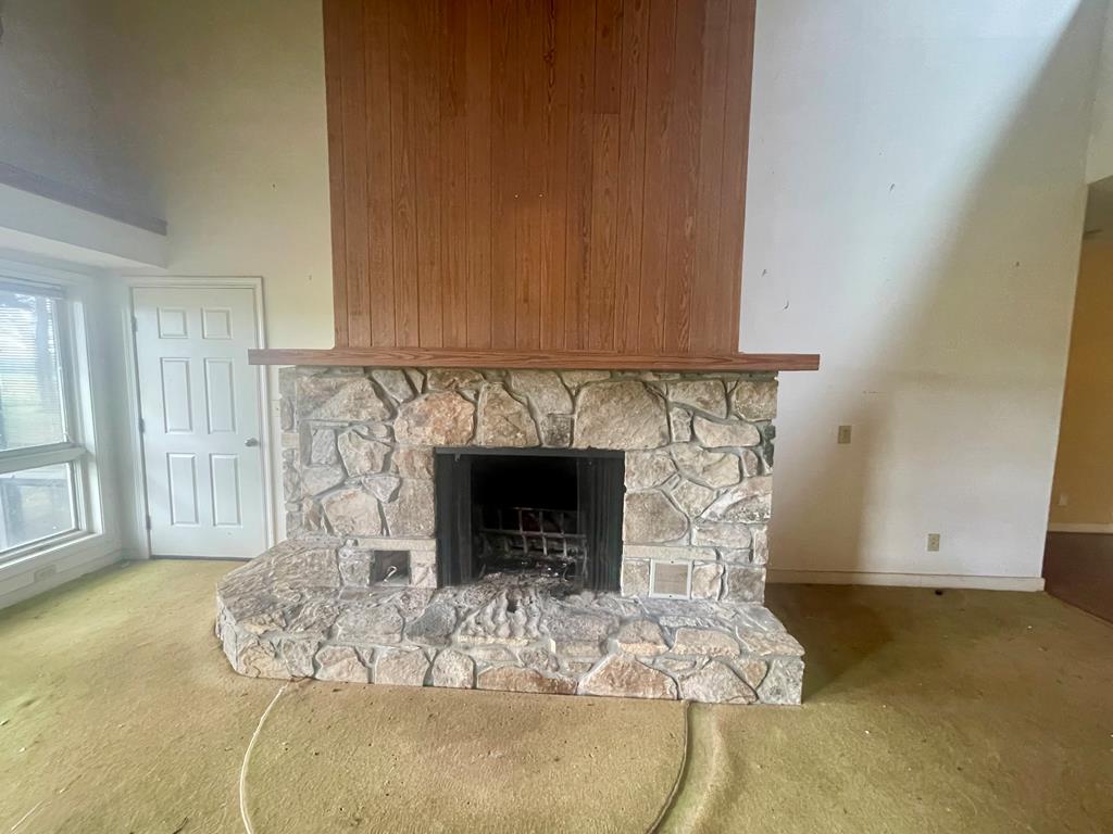 574 Old Chipley Road Pine Mountain, GA 31822 - Photo 7 of 61 a living room with furniture and a fireplace