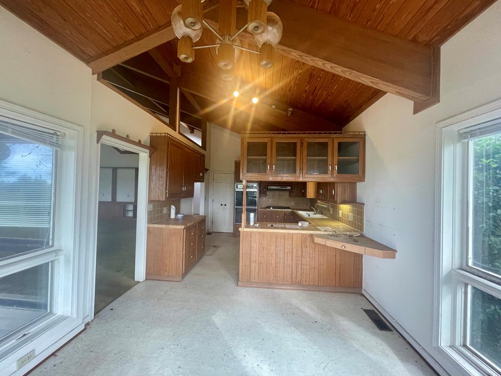 574 Old Chipley Road Pine Mountain, GA 31822 - Photo 10 of 61 a kitchen with stainless steel appliances granite countertop a refrigerator and a stove