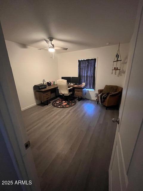 2000 South Apache Road, Unit 296 Buckeye, AZ 85326 - Photo 12 of 23 a living room with furniture and a ceiling fan