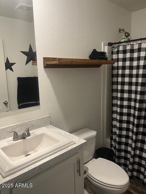 2000 South Apache Road, Unit 296 Buckeye, AZ 85326 - Photo 13 of 23 a bathroom with a sink toilet and shower