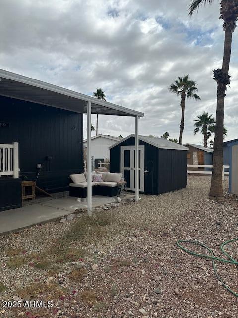 2000 South Apache Road, Unit 296 Buckeye, AZ 85326 - Photo 16 of 23 a view of a house with backyard