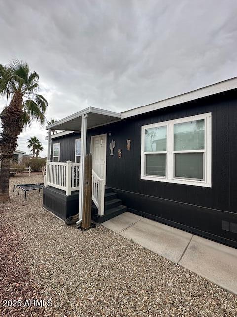 2000 South Apache Road, Unit 296 Buckeye, AZ 85326 - Photo 20 of 23 a front view of a house with a yard