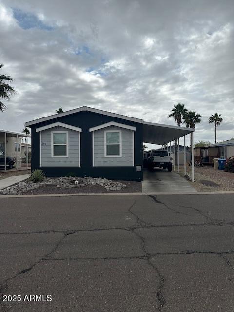 2000 South Apache Road, Unit 296 Buckeye, AZ 85326 - Photo 23 of 23 a view of a house with a patio