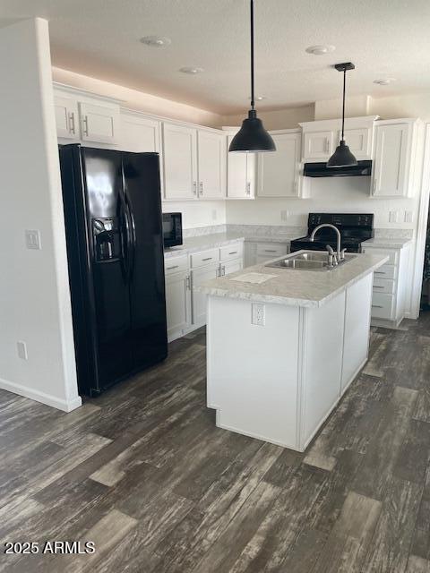 2000 South Apache Road, Unit 296 Buckeye, AZ 85326 - Photo 4 of 23 a kitchen with stainless steel appliances a stove a refrigerator and a sink