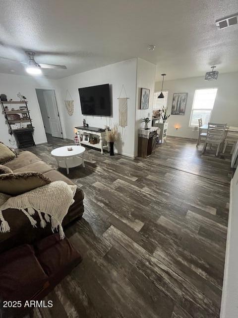 2000 South Apache Road, Unit 296 Buckeye, AZ 85326 - Photo 5 of 23 a living room with furniture and a flat screen tv