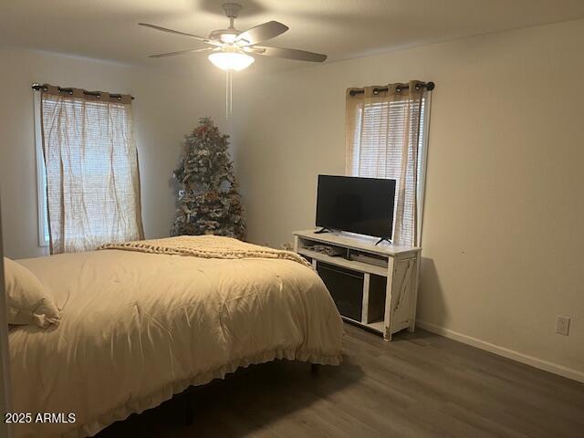 2000 South Apache Road, Unit 296 Buckeye, AZ 85326 - Photo 10 of 23 a bedroom with a bed and a flat screen tv