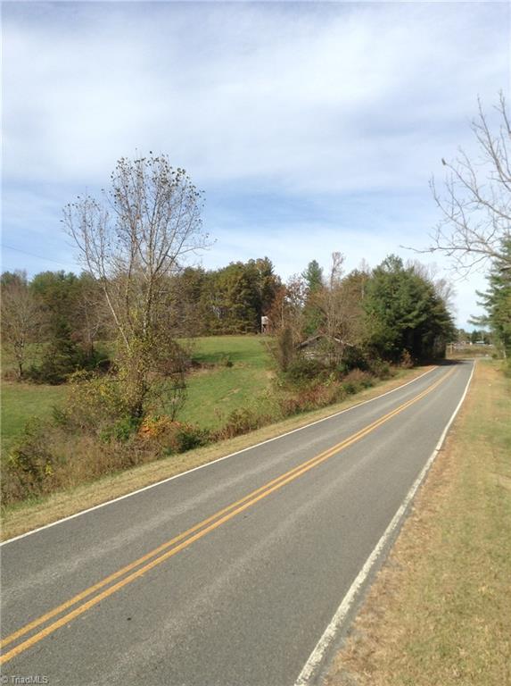 1 Mears Road Mount Airy, NC 27030 - Photo 5 of 12 Two-lane Mears Rd. showing tobacco barn. This road connects to Hatcher's Chapel Rd. in Virginia. This property is minutes from the Blue Ridge Parkway.