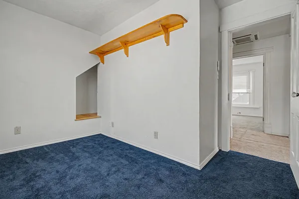 a view of a window in an empty room