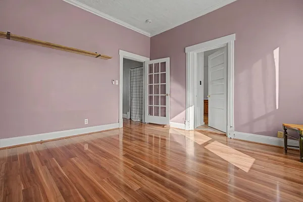 a view of a yard with a house in the background