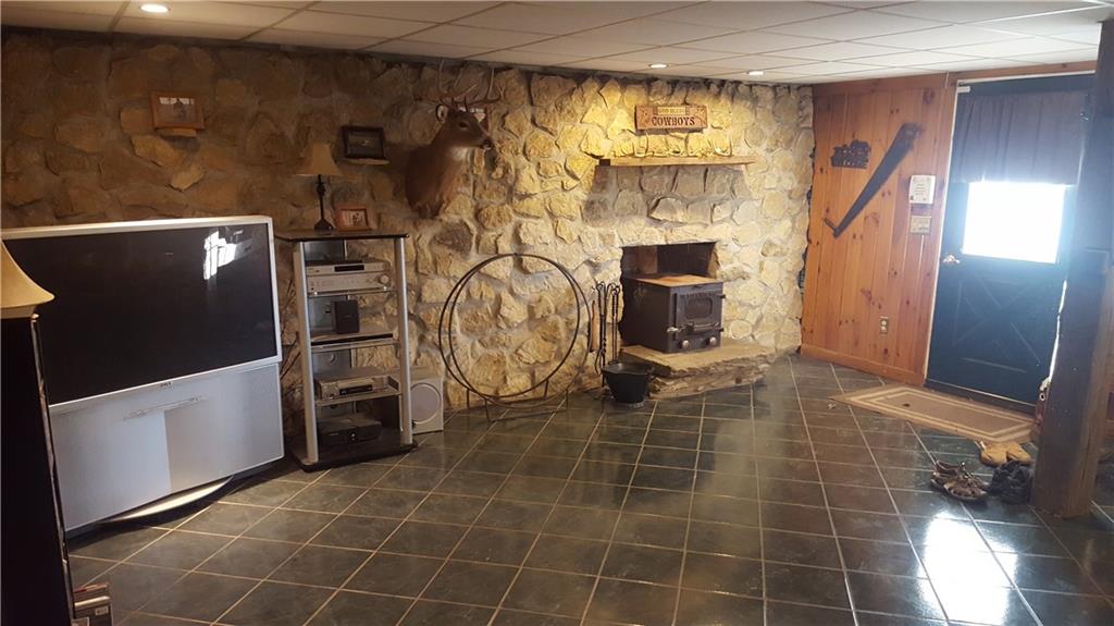26 Ligo Road Mercer, PA 16137 - Photo 8 of 15 Stone work and wood stove