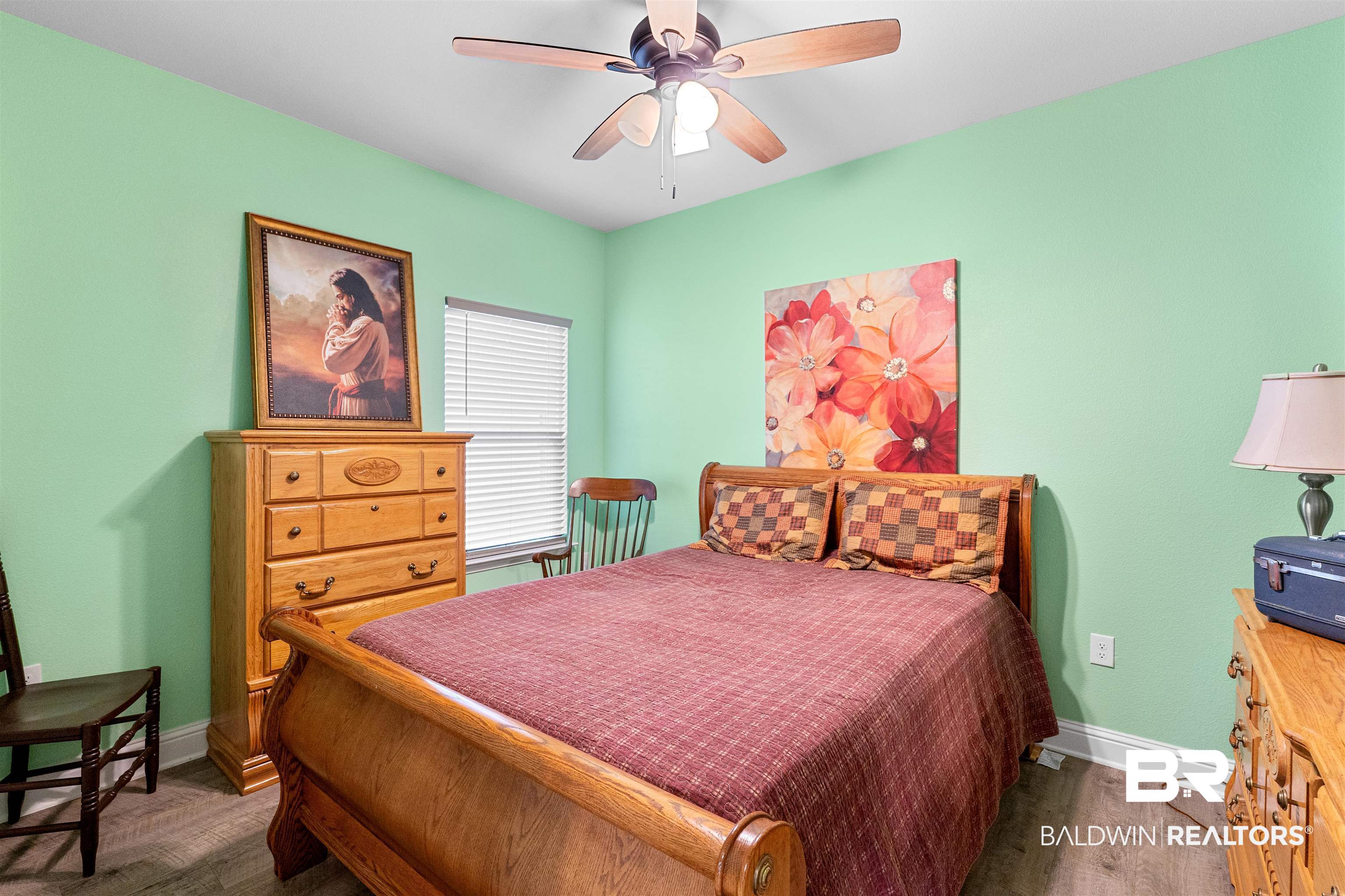 697 Calibre Street Fairhope, AL 36532 - Photo 12 of 18 Bedroom featuring dark wood-style flooring and a ceiling fan