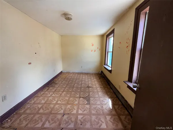 a view of an empty room and window