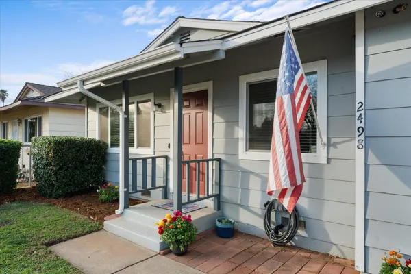 a front view of a house with a porch