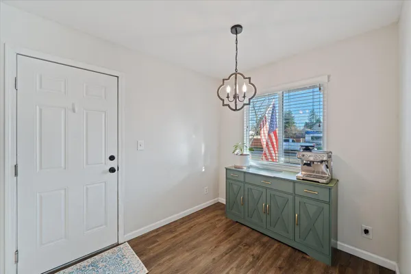 a view of a kitchen from the hallway
