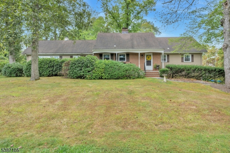 1 Crest Drive Bernards, NJ 07920 - Photo 1 of 21 a view of a house with a yard and plants