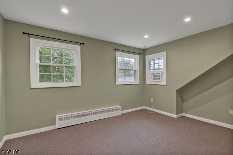 1 Crest Drive Bernards, NJ 07920 - Photo 14 of 21 a view of empty room with windows
