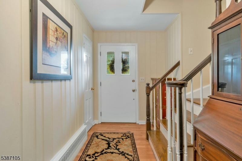 1 Crest Drive Bernards, NJ 07920 - Photo 4 of 21 a view of an entryway with wooden floor