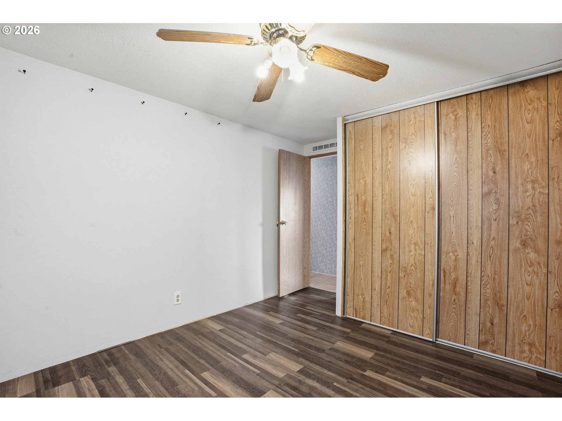 144 Angels Lane Kalama, WA 98625 - Photo 17 of 28 a view interior of a house with a ceiling fan and wooden floor