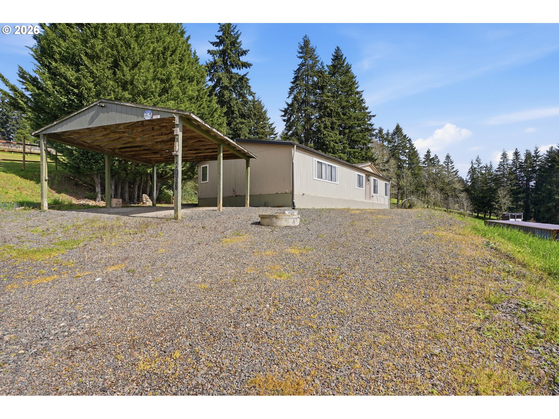 144 Angels Lane Kalama, WA 98625 - Photo 22 of 28 a backyard of a house with lots of green space