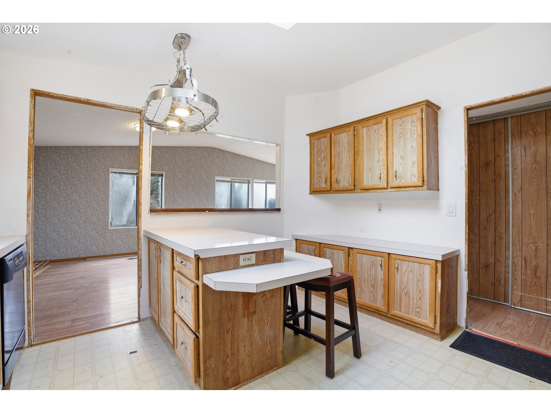 144 Angels Lane Kalama, WA 98625 - Photo 6 of 28 a view of a dining room with furniture and chandelier