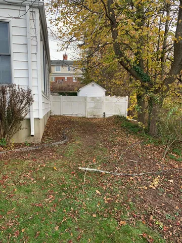 a view of a back yard of the house