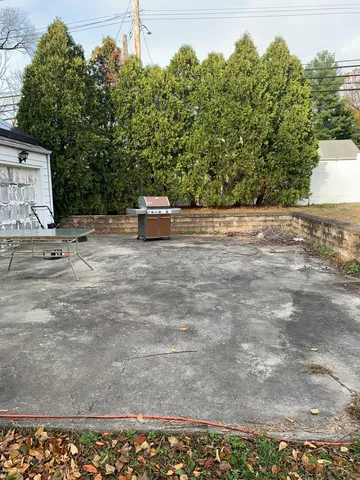 a view of a parking space with a car parked