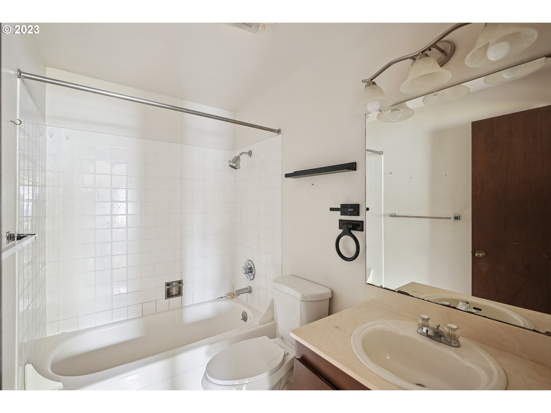 2295 Northeast Juniper Avenue Gresham, OR 97030 - Photo 13 of 25 a bathroom with a granite countertop sink toilet and shower