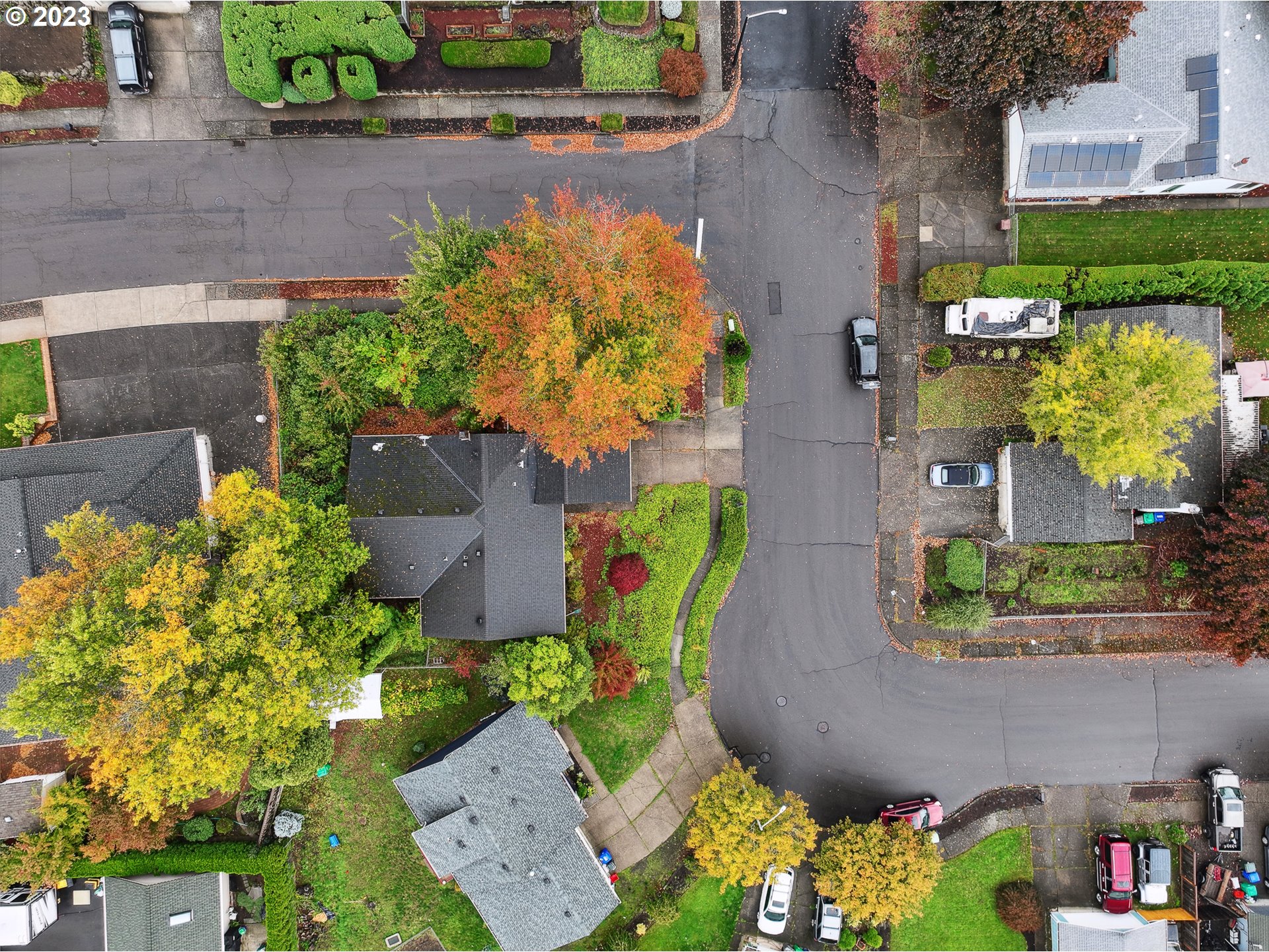 2295 Northeast Juniper Avenue Gresham, OR 97030 - Photo 24 of 25 an aerial view of a house with a yard and a garden
