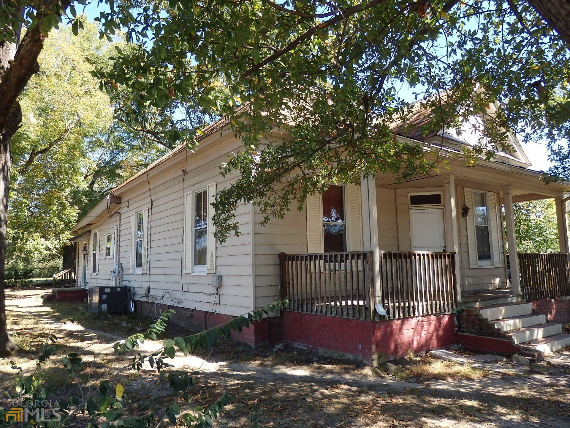 6 East Callahan Street Rome, GA 30161 - Photo 1 of 1 a front view of a house with a tree