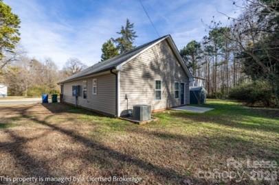 100 Henson Street Albemarle, NC 28001 - Photo 23 of 24 a view of a house with backyard and trees