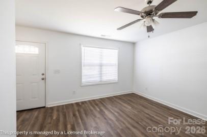100 Henson Street Albemarle, NC 28001 - Photo 4 of 24 an empty room with a window and a ceiling fan
